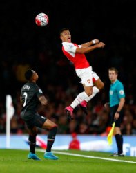 LONDON, THE UNITED KINGDOMT - AUGUST 24: Alexis Sanchez of Arsenal minds above Nathaniel Clyne of Liverpool during the Barclays Premier League match between Arsenal and Liverpool at the Emirates Stadium on August 24, 2015 in London, great britain. (picture by Julian Finney/Getty photos)