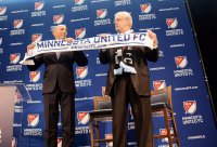 Major League Soccer Commissioner Don Garber, left, welcomed Minnesota United owner Bill McGuire to the top level of professional soccer during a news conference, Friday, March 25, 2015.
