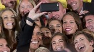 President Obama poses for a selfie using the U.S. ladies'