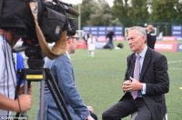 Tims features established a fund-raising attempt but feels poorly disappointed by Richard Scudamore (right)