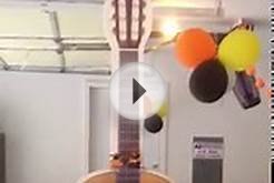 Guitar and soccer ball cupcake graduation displays like no