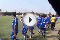 Teams Walking Onto The Pitch. One World Soccer Game